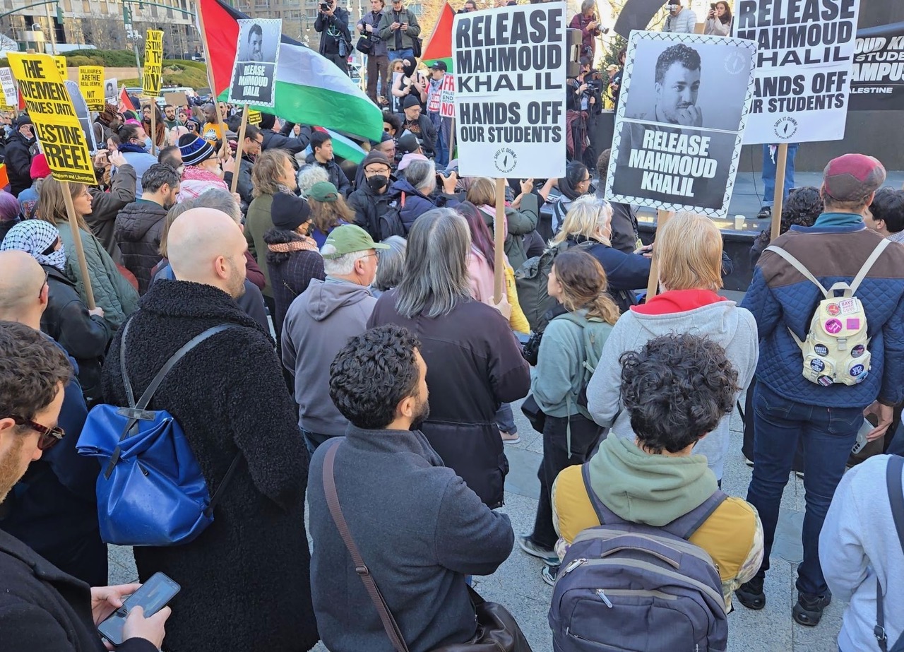 protesters with signs to Release Mahmoud Khalil